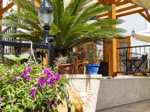 Отель WOO Town Suites