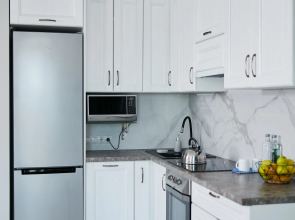 Апартаменты Luma White #2 в центре города с красивым видом на балконе