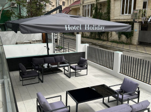 Отель Holiday