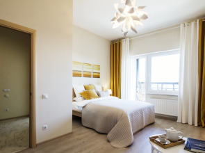 Апартаменты Cozy River and Park View Apartment