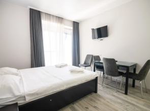 Апартаменты Bright Apartment with Balcony in Alliance Palace Batumi - Steps from the Sea & Dancing Fountains