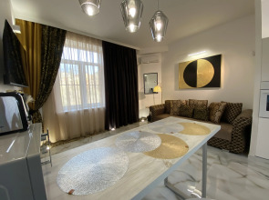 Апартаменты в современном стиле с камином