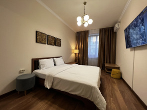 Апартаменты возле Парка на Аллее Строителей by Sutki26