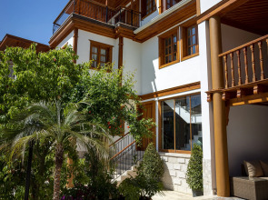 Отель WOO Town Suites