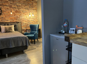 Апартаменты с Часами в Стиле Лофт