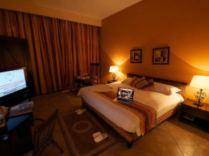 Курортный Отель Swiss Inn Pyramids Golf Resort