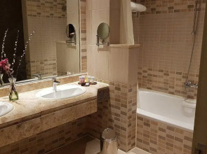 Курортный Отель Swiss Inn Pyramids Golf Resort