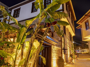 Отель WOO Town Suites