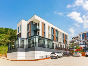 Квартира Дизайнерская студия на закрытой территории рядом с бассейном