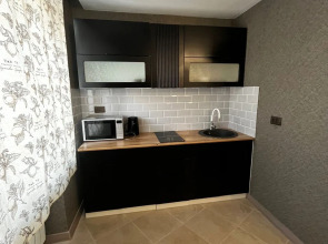 Апартаменты Уютная двухкомнатная квартира в центре