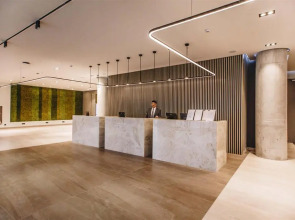 Отель Mona Plaza