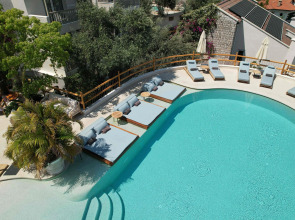 Отель Pilos Suites