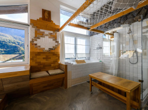 Апартаменты Оплот ETHNICA Дизайн Студия | 40м² | 3 Этаж Ваше Окно в Горы