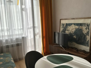 Апартаменты в Центре Города с Видом на Гору