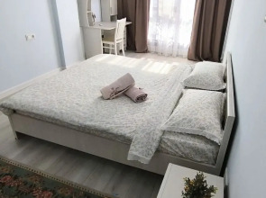 Квартира Уютные апартаменты возле парка Ынтымак