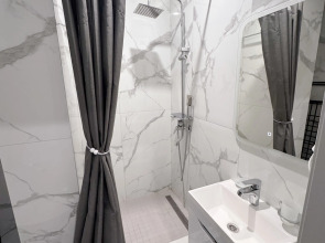 Апартаменты Orange Apart в центре Сочи на Навагинской