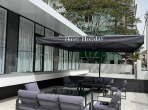 Отель Holiday