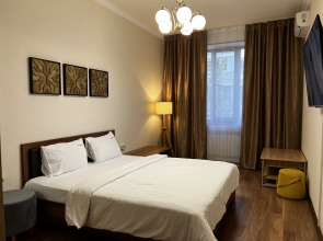 Апартаменты возле Парка на Аллее Строителей by Sutki26