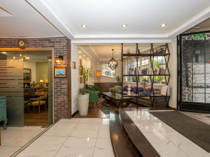 Отель The Marions Suite