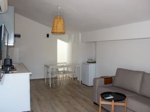 Отель Aloha Suites