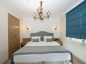 Отель The Marions Suite