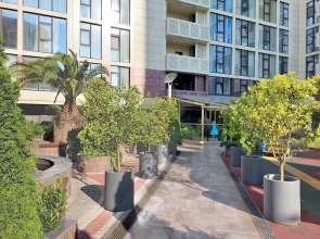 Апартаменты Студия с дизайнерским ремонтом с бассейном на крыше