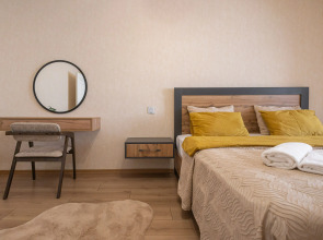 Апартаменты Двухспальные с Гостиной Комнатой в Центре Города