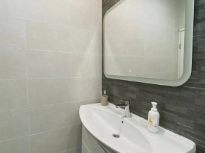 Апартаменты в Центре Города  на Высоком Этаже