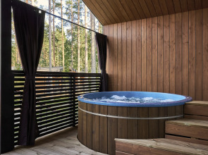 Частный дом с теплой купелью с джакузи и зоной барбекю Land Breeze