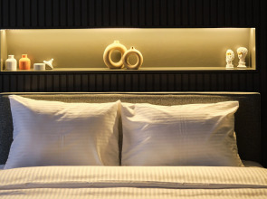 Отель TAKS-INN Suites