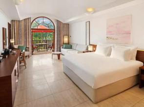 Отель JA The Resort - JA Palm Tree Court