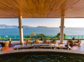 Отель Wyndham Grand Phuket Kalim Bay