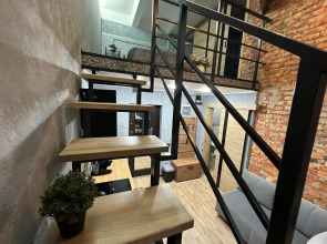 Апартаменты Двухуровневая студия с двумя санузлами в парке