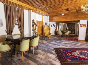 Отель WOO Town Suites