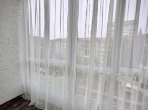 Апартаменты в Центре Города с Видом на Гору