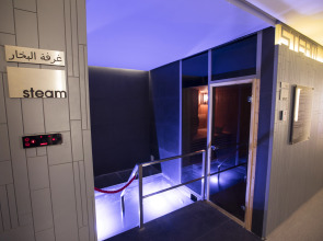 Отель The ACT Hotel - Sharjah