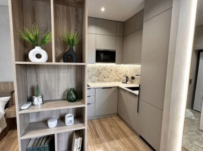 Апартаменты на втором этаже с балкoном