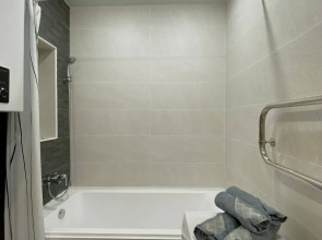 Апартаменты в Центре Города  на Высоком Этаже