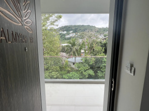 Апартаменты Palmyrah Surin Beach Residences