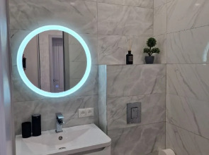 Квартира Flatirini с панорамными окнами в новом ЖК 1