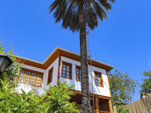 Отель WOO Town Suites