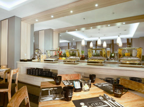 Отель Neo Denpasar