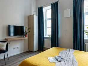 Апартаменты Beige apartment in a historic building in the city center