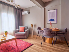 Отель TAKS-INN Suites