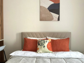 Апартаменты Уютная студия рядом с Аквапарком и Чашей