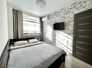 Двухкомнатная квартира сети "PanApartments" с панорамным видом на город