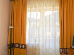 Отель NATIONAL Dombay