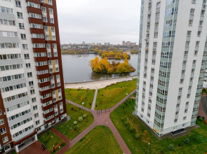 Апартаменты с панорамными окнами на набережной реки