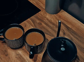 Шале А-фрейм с панорамным остеклением и террасой