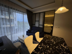 Апартаменты Palmyrah Surin Beach Residences